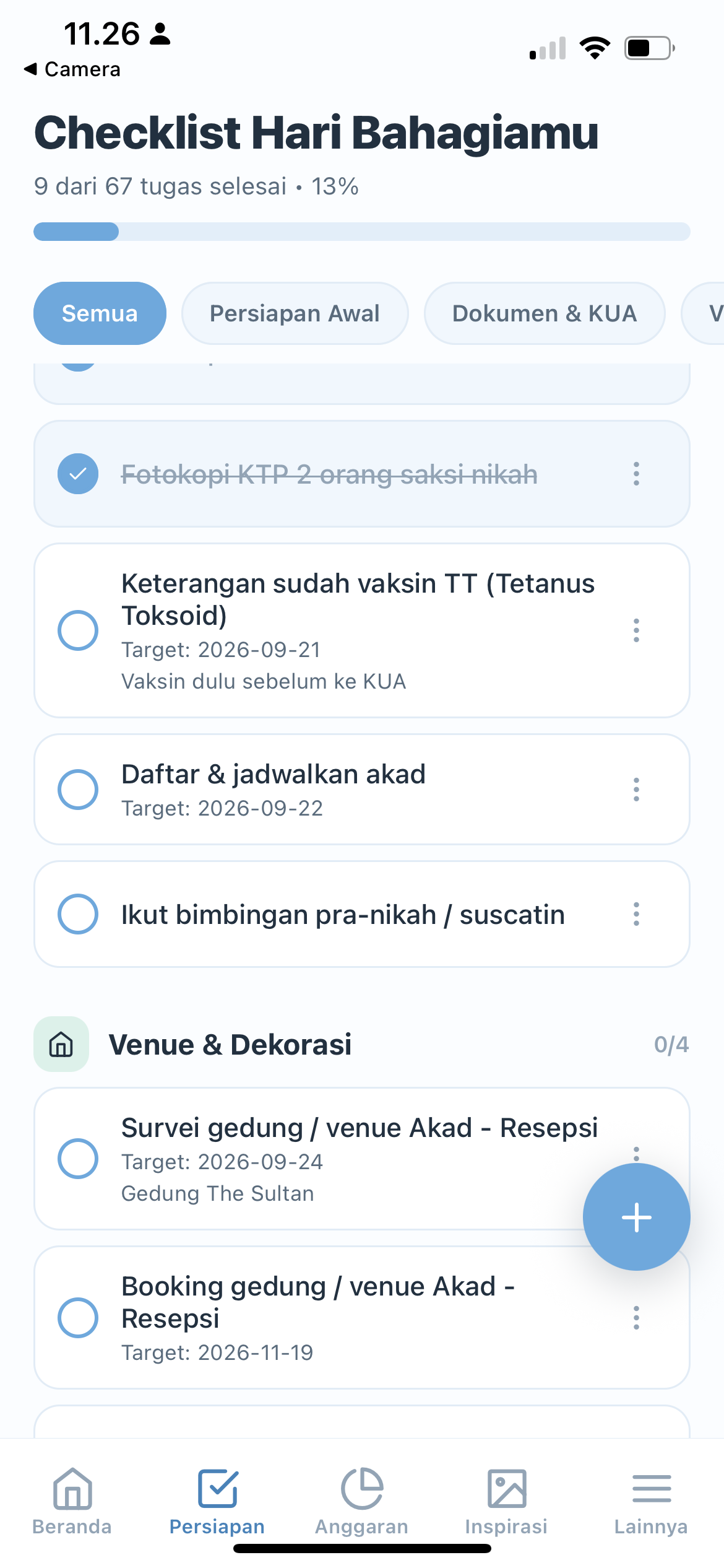 Ponsel Denny menampilkan checklist persiapan pernikahan